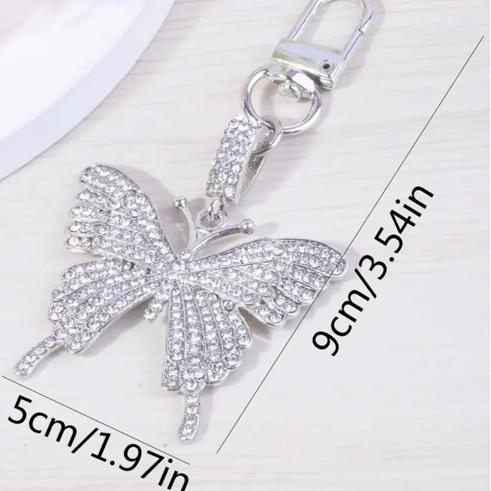 NEW Butterfly Silver Sparkle Rhinestone Bag Charm Keychain Ear Bud Accessory - Picture 2 of 2